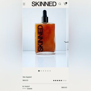 Skinned Shimmering Body Oil NIB 3.4 Fl Oz